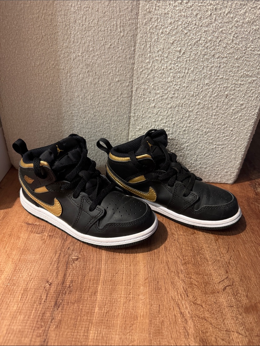 Nike Black and Gold Kids High-Top Sneakers